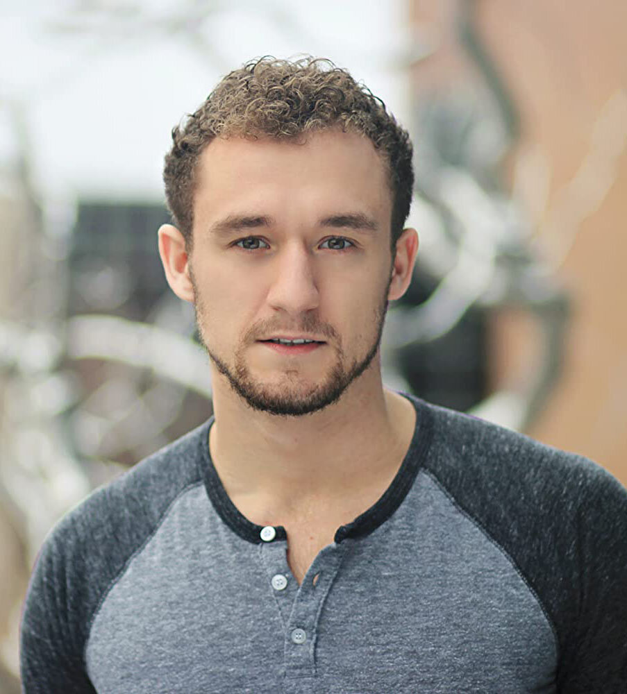 Blake Price as Officer Tillman in FBI: Most Wanted