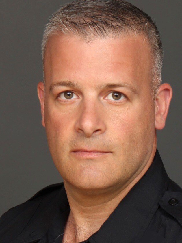 Frank Bal as Armed Guard 1 in FBI: Most Wanted