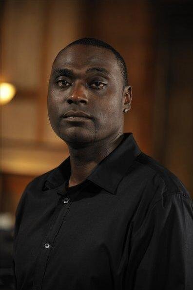 William "Big Sleeps" Stewart as Umar Kader in Fire Country