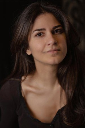 Negin Kamali as Firecracker's Assistant in The Boys